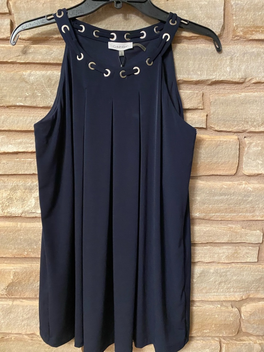 Calvin Klein navy blue sleeveless top with a grommet neckline detail Size M-NWT